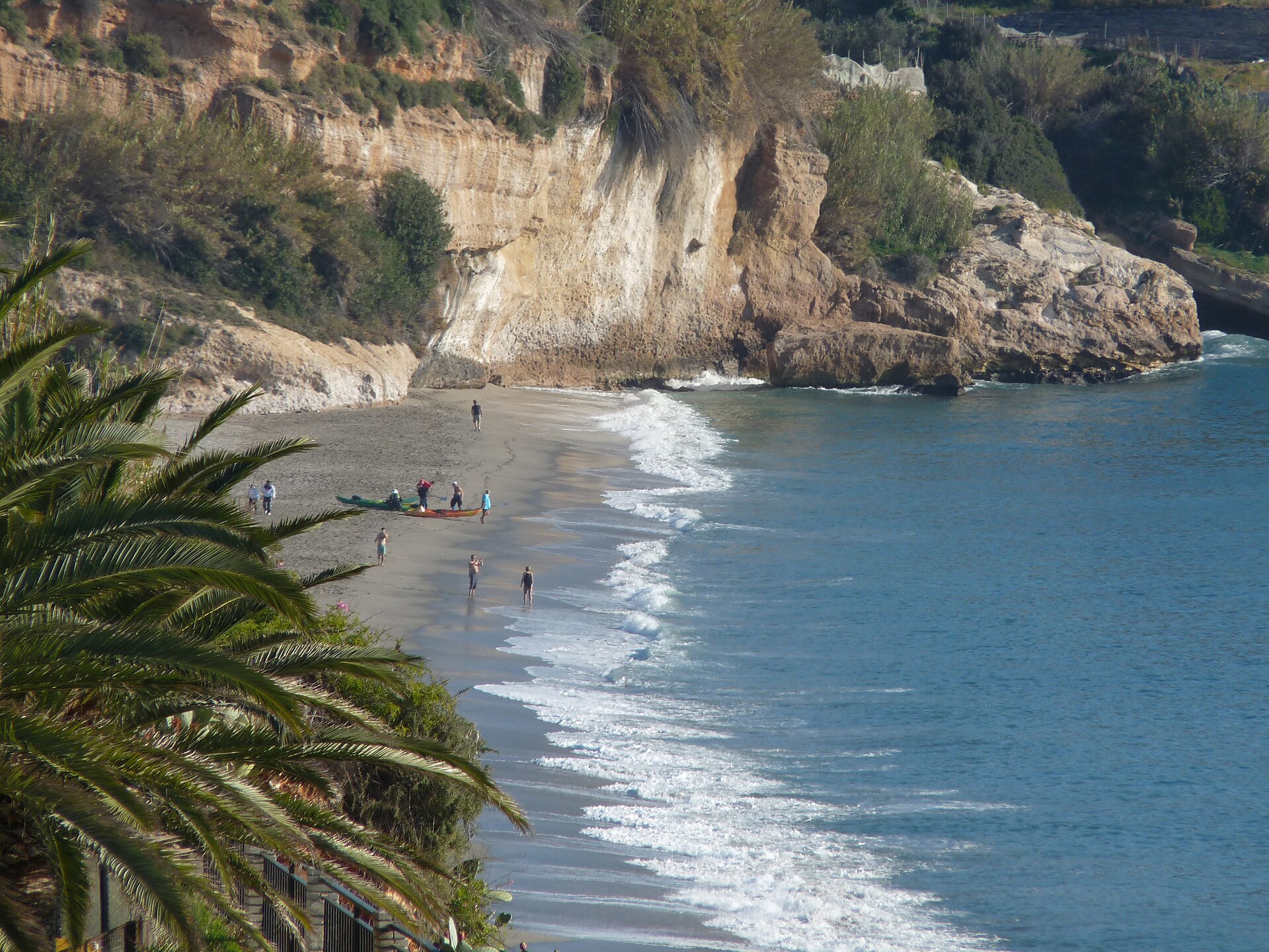 Burriana Beach and its cliff-backed coastline in Nerja