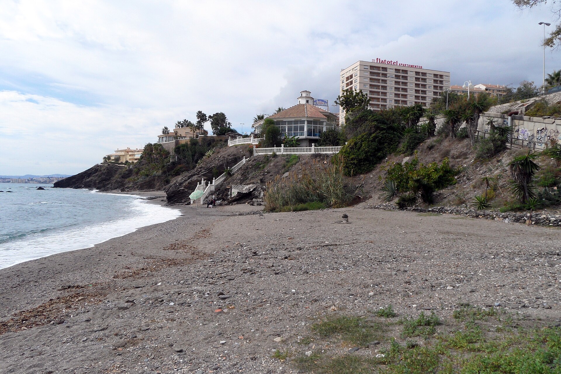The rocky cove and vegetation around La Viborilla Beach in Benalmádena